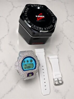 G-Shock White Watch with Silver Crystal-Encrusted Bezel and Blue Display